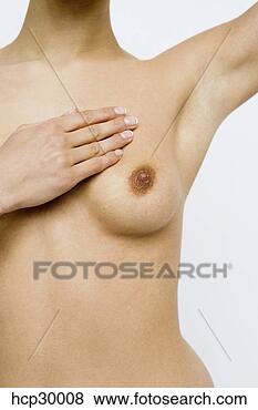 Stock Photo - young woman probing 
breast for cancer 
self examination. 
fotosearch - search 
stock photos, 
pictures, images, 
and photo clipart
