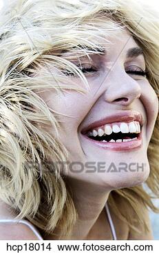 Stock Photo - young woman laughing. 
fotosearch - search 
stock photos, 
pictures, images, 
and photo clipart