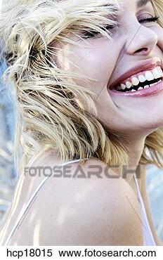 Stock Image - young woman laughing. 
fotosearch - search 
stock photos, 
pictures, images, 
and photo clipart