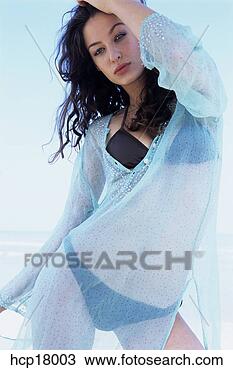 Stock Photo - young woman posing. 
fotosearch - search 
stock photos, 
pictures, images, 
and photo clipart