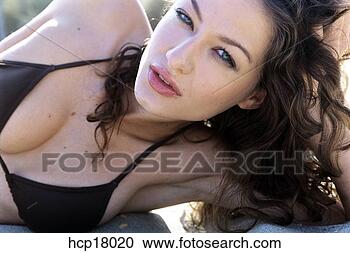 Stock Photography - young woman posing. 
fotosearch - search 
stock photos, 
pictures, images, 
and photo clipart