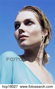 Picture - young woman posing. 
fotosearch - search 
stock photos, 
pictures, images, 
and photo clipart