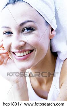 Picture - young woman smiling. 
fotosearch - search 
stock photos, 
pictures, images, 
and photo clipart