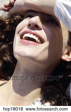 Stock Photo - young woman smiling. 
fotosearch - search 
stock photos, 
pictures, images, 
and photo clipart