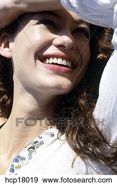Stock Photograph - young woman smiling. 
fotosearch - search 
stock photos, 
pictures, images, 
and photo clipart