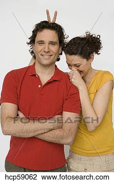 Stock Photo - man pointing at 
surprised woman. 
fotosearch - search 
stock photos, 
pictures, images, 
and photo clipart