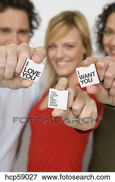 Picture - people holding 
out romantic notes. 
fotosearch - search 
stock photos, 
pictures, images, 
and photo clipart