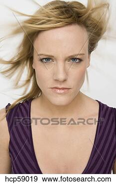 Stock Photograph - woman frowning. 
fotosearch - search 
stock photos, 
pictures, images, 
and photo clipart