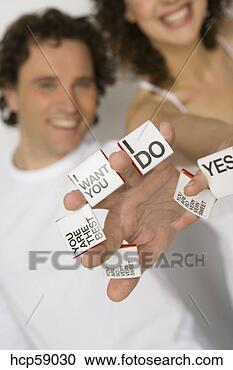 Stock Photography - woman holding 
out romantic notes. 
fotosearch - search 
stock photos, 
pictures, images, 
and photo clipart
