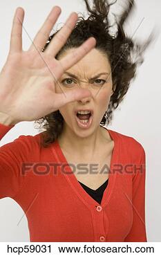Stock Photography - woman holding 
out hand in protest. 
fotosearch - search 
stock photos, 
pictures, images, 
and photo clipart