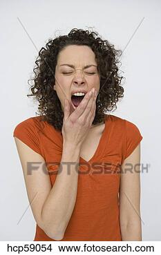 Stock Photo - woman yawning. 
fotosearch - search 
stock photos, 
pictures, images, 
and photo clipart