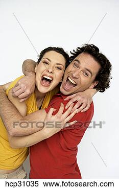 Stock Image - young couple hugging. 
fotosearch - search 
stock photos, 
pictures, images, 
and photo clipart