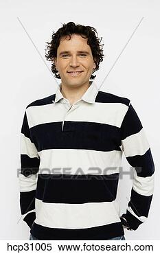 Stock Image - young man smiling. 
fotosearch - search 
stock photos, 
pictures, images, 
and photo clipart