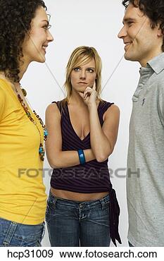 Stock Photograph - young woman examining 
young couple. 
fotosearch - search 
stock photos, 
pictures, images, 
and photo clipart