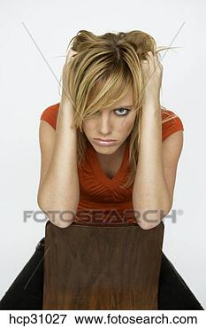 Picture - young woman pulling 
her hair. fotosearch 
- search stock 
photos, pictures, 
images, and photo 
clipart