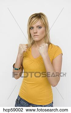 Stock Photo - young woman reading 
to fight. fotosearch 
- search stock 
photos, pictures, 
images, and photo 
clipart