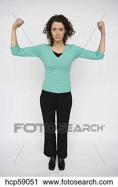 Stock Photography - young woman squeezing 
her muscles. fotosearch 
- search stock 
photos, pictures, 
images, and photo 
clipart