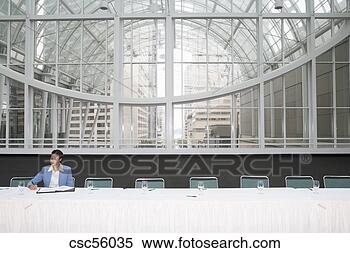 Stock Image - african businesswoman 
at table. fotosearch 
- search stock 
photos, pictures, 
images, and photo 
clipart