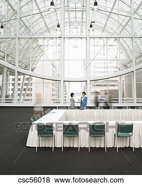 Stock Photo - businesspeople 
at conference. 
fotosearch - search 
stock photos, 
pictures, images, 
and photo clipart