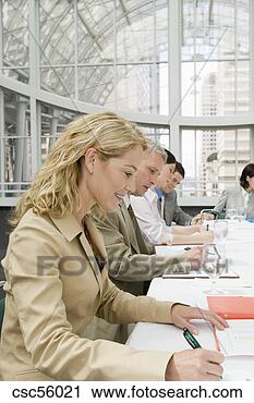 Stock Photography - businesspeople 
at conference. 
fotosearch - search 
stock photos, 
pictures, images, 
and photo clipart