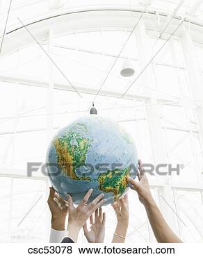Stock Photo - businesspeople 
holding globe. 
fotosearch - search 
stock photos, 
pictures, images, 
and photo clipart