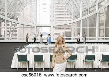 Stock Photo - businesswoman 
with hand on hip. 
fotosearch - search 
stock photos, 
pictures, images, 
and photo clipart