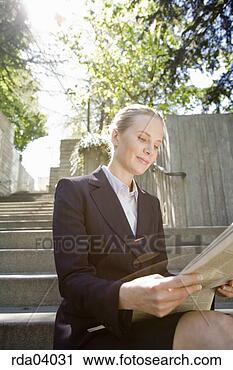 Stock Photography - businesswoman 
reading newspaper. 
fotosearch - search 
stock photos, 
pictures, images, 
and photo clipart