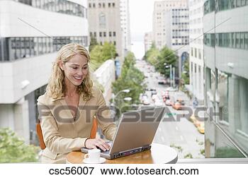 Picture - businesswoman 
typing on laptop. 
fotosearch - search 
stock photos, 
pictures, images, 
and photo clipart