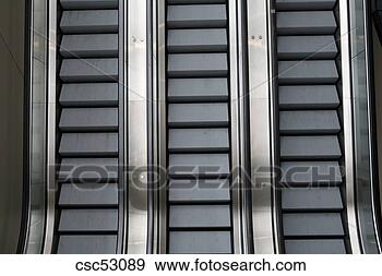 Stock Photograph - high angle view 
of escalators. 
fotosearch - search 
stock photos, 
pictures, images, 
and photo clipart