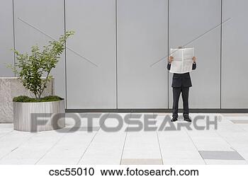 Stock Photography - businessman reading 
newspaper. fotosearch 
- search stock 
photos, pictures, 
images, and photo 
clipart