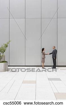 Stock Photo - businesspeople 
shaking hands. 
fotosearch - search 
stock photos, 
pictures, images, 
and photo clipart