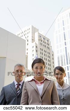 Stock Photo - businesspeople 
standing in formation. 
fotosearch - search 
stock photos, 
pictures, images, 
and photo clipart