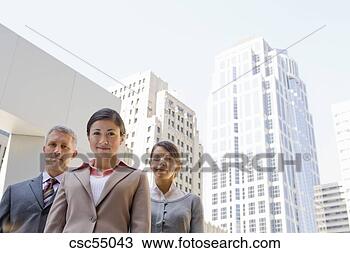Stock Photo - businesspeople 
standing in formation. 
fotosearch - search 
stock photos, 
pictures, images, 
and photo clipart
