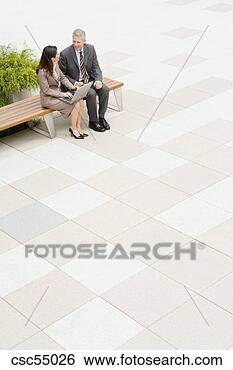 Stock Photo - businesspeople 
talking on bench. 
fotosearch - search 
stock photos, 
pictures, images, 
and photo clipart