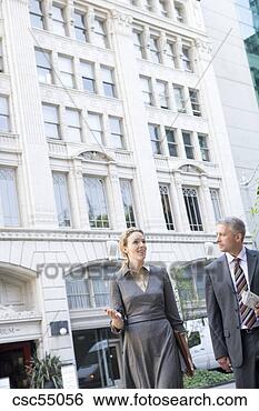 Stock Photo - businesspeople 
talking outdoors. 
fotosearch - search 
stock photos, 
pictures, images, 
and photo clipart