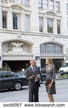 Picture - businesspeople 
talking outdoors. 
fotosearch - search 
stock photos, 
pictures, images, 
and photo clipart