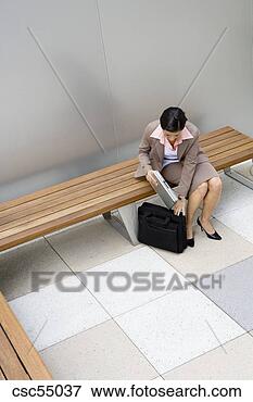 Picture - businesswoman 
putting away laptop. 
fotosearch - search 
stock photos, 
pictures, images, 
and photo clipart