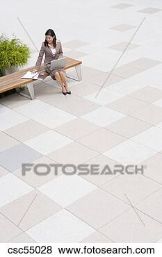 Stock Photo - businesswoman 
sitting on bench. 
fotosearch - search 
stock photos, 
pictures, images, 
and photo clipart