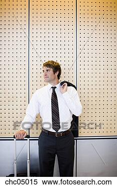 Stock Image - businessman holding 
jacket over shoulder. 
fotosearch - search 
stock photos, 
pictures, images, 
and photo clipart