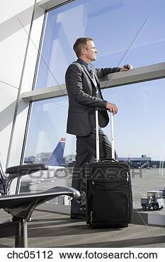 Stock Photo - businessman looking 
out airport window. 
fotosearch - search 
stock photos, 
pictures, images, 
and photo clipart