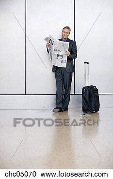 Stock Photography - businessman reading 
newspaper. fotosearch 
- search stock 
photos, pictures, 
images, and photo 
clipart