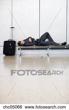 Stock Photo - businessman sleeping 
on bench. fotosearch 
- search stock 
photos, pictures, 
images, and photo 
clipart