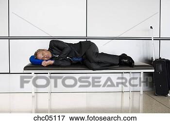 Picture - businessman sleeping 
on bench. fotosearch 
- search stock 
photos, pictures, 
images, and photo 
clipart