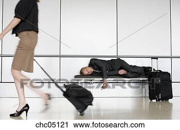 Stock Photography - businessman sleeping 
on bench. fotosearch 
- search stock 
photos, pictures, 
images, and photo 
clipart