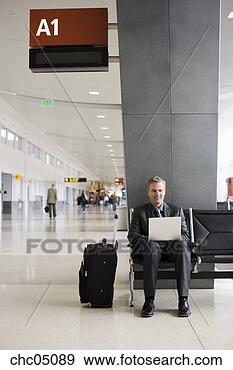 Stock Photograph - businessman typing 
on laptop. fotosearch 
- search stock 
photos, pictures, 
images, and photo 
clipart