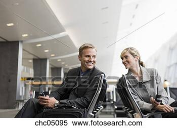 Stock Image - businesspeople 
holding cell phones. 
fotosearch - search 
stock photos, 
pictures, images, 
and photo clipart