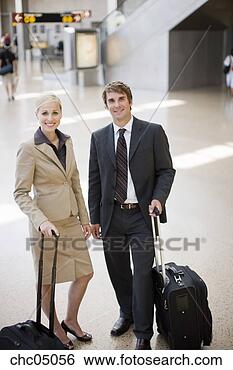 Stock Photo - businesspeople 
holding suitcases. 
fotosearch - search 
stock photos, 
pictures, images, 
and photo clipart