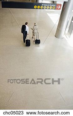 Stock Photo - businesspeople 
pulling suitcases. 
fotosearch - search 
stock photos, 
pictures, images, 
and photo clipart