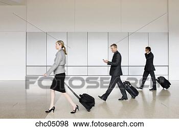 Stock Photo - businesspeople 
pulling suitcases. 
fotosearch - search 
stock photos, 
pictures, images, 
and photo clipart