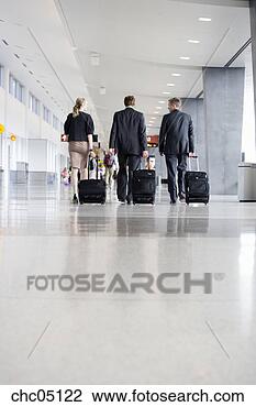 Stock Photo - businesspeople 
pulling suitcases. 
fotosearch - search 
stock photos, 
pictures, images, 
and photo clipart